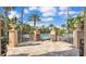 Stylish pool patio with comfortable seating overlooking the community pool and lush landscaping at 3919 Vista Trace Way, Lakeland, FL 33810
