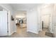 Inviting entryway flows to the kitchen and dining area with easy access to laundry at 4189 Marseille Ln, Lakeland, FL 33810