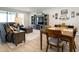 Inviting living room features a comfortable sofa, entertainment center, and stylish décor at 4189 Marseille Ln, Lakeland, FL 33810