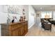 Entryway featuring a console table with décor and an open view to the spacious living room at 4189 Marseille Ln, Lakeland, FL 33810