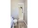 Bathroom with new vanity, toilet, and walk-in shower at 4228 Sunny Land Dr, Lakeland, FL 33813