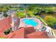 An aerial view of community pool, clubhouse, tennis courts and gazebo at 4488 Whistlewood Cir, Lakeland, FL 33811