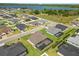 Aerial view of the home nestled in a community close to a beautiful lake at 5020 Truman Ln, Lakeland, FL 33812