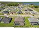 Aerial view of the home nestled in a community close to a beautiful lake at 5020 Truman Ln, Lakeland, FL 33812