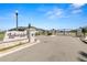 Gated community entrance to Lakeside Heritage with stone signage and well-maintained landscaping at 5020 Truman Ln, Lakeland, FL 33812