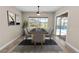 Bright dining room featuring modern decor and sliding glass doors to a pool at 5020 Truman Ln, Lakeland, FL 33812