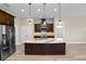 Stylish kitchen with a central island, ample cabinetry, and stainless appliances at 5020 Truman Ln, Lakeland, FL 33812
