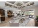 Bright and airy living room featuring coffered ceilings and an open floor plan at 5020 Truman Ln, Lakeland, FL 33812