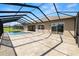 Screened-in pool and patio area, offering privacy and protection from the elements at 5020 Truman Ln, Lakeland, FL 33812