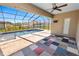 Screened-in pool with a paved patio, offering an ideal outdoor living space at 5020 Truman Ln, Lakeland, FL 33812