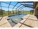 Sparkling pool with spa and screened enclosure, ideal for relaxation and recreation at 5020 Truman Ln, Lakeland, FL 33812