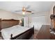 Bedroom featuring a ceiling fan and ensuite access at 5432 Weber Pl, Lakeland, FL 33809