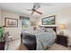 Charming bedroom with calming neutral tones, soft natural light, and tasteful artwork at 5432 Weber Pl, Lakeland, FL 33809