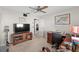 Bright office space with a large desk, chair, and a view to another room at 5432 Weber Pl, Lakeland, FL 33809