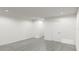 Spacious bedroom with light gray wood floors, white walls, and recessed lighting at 5752 Anders Way, St Cloud, FL 34771