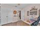 Bright bedroom with desk area and lots of storage is adjacent to hallway and closet at 5883 Great Salt Ct, Lakeland, FL 33805