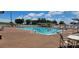 Enjoy the sunshine at the sparkling community pool with ample seating at 6059 Condor Dr, Lakeland, FL 33809