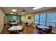 Bright community room with tables and chairs, perfect for gatherings at 6059 Condor Dr, Lakeland, FL 33809