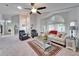 Bright living room featuring high ceilings, comfortable seating, and ample natural light at 6059 Condor Dr, Lakeland, FL 33809