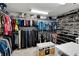 Spacious walk-in closet boasting shelving, multiple hanging rods, and shoe racks at 6059 Condor Dr, Lakeland, FL 33809