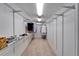 Organized walk-in closet featuring ample shelving and hanging space at 6059 Condor Dr, Lakeland, FL 33809
