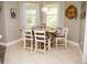 Cozy breakfast nook with a charming table set, bright windows, and decor at 6472 Evergreen Park Dr, Lakeland, FL 33813