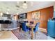 Inviting dining area adjacent to the kitchen, featuring stylish decor and comfortable seating for Gathering and guests at 661 Black Eagle Dr, Groveland, FL 34736