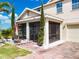 Relaxing screened-in lanai of this home offers a tranquil outdoor space for entertaining and enjoying the serene surroundings at 661 Black Eagle Dr, Groveland, FL 34736