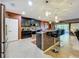 The kitchen features stainless steel appliances, recessed lighting, and a mosaic tile backsplash at 661 Black Eagle Dr, Groveland, FL 34736