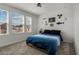 Bright bedroom with nautical decor, ample natural light from multiple windows, and a calming ambiance at 728 Trotters Dr, Eagle Lake, FL 33839