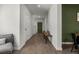Inviting entryway features a bench, coat closet, and clean modern finishes, creating a welcoming ambiance at 728 Trotters Dr, Eagle Lake, FL 33839