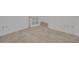 Bedroom showcasing tile flooring and white trim, creating a clean and modern aesthetic at 7947 Lake James Blvd, Lakeland, FL 33810