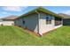 Side view of a well maintained single-story home at 7947 Lake James Blvd, Lakeland, FL 33810