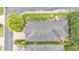 Aerial view of house featuring a well-maintained roof, driveway and landscaping at 914 Christina Chase Dr # Drive, Lakeland, FL 33813