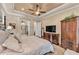 Bedroom view looking into a bathroom shows a decorative ceiling and a warm, inviting atmosphere at 914 Christina Chase Dr # Drive, Lakeland, FL 33813