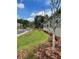 Well-maintained lawn with new landscaping along the side of the house and street view at 914 Christina Chase Dr # Drive, Lakeland, FL 33813