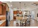 An open-concept kitchen with dark wood cabinets and large island at 914 Christina Chase Dr # Drive, Lakeland, FL 33813