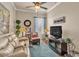 This living room features a cream-colored couch, a patterned rug, a faux fireplace, and accent lighting at 914 Christina Chase Dr # Drive, Lakeland, FL 33813