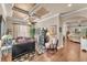 Office with coffered ceilings, wood floors, large windows, a black desk, and unique decor at 914 Christina Chase Dr # Drive, Lakeland, FL 33813