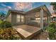 Back patio area featuring a brick patio and screen enclosure, perfect for enjoying outdoor living at 914 Christina Chase Dr # Drive, Lakeland, FL 33813