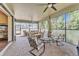 Relaxing patio with ample seating, a ceiling fan, brick floors, and an outside view at 914 Christina Chase Dr # Drive, Lakeland, FL 33813