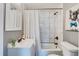 This stylish bathroom features a vanity with a sink, a toilet, and a shower-tub combo at 1028 W Marjorie St, Lakeland, FL 33815