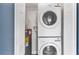This laundry room features a stackable washer and dryer and plenty of space for your needs at 1028 W Marjorie St, Lakeland, FL 33815