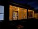 Screened in porch featuring brick flooring, outdoor lights, table with seating, and an exterior view at 10812 Versailles Blvd. Blvd, Clermont, FL 34711
