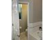 The toilet room has a small window and is located adjacent to the tub at 10812 Versailles Blvd. Blvd, Clermont, FL 34711