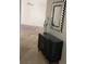 Stylish entryway with decorative mirror and accent furniture at 11953 Delfina Ln, Orlando, FL 32827