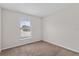 Bedroom with neutral carpet and a window, offering a calm atmosphere at 120 Flatfish Ct, Kissimmee, FL 34759