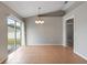 Open dining area featuring neutral walls, tile flooring, and natural light at 120 Flatfish Ct, Kissimmee, FL 34759