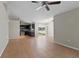Open-concept living room and kitchen area with tile floors, perfect for entertaining and Gathering gatherings at 120 Flatfish Ct, Kissimmee, FL 34759