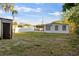 The backyard offers an enclosed yard at 126 Mason St, Auburndale, FL 33823